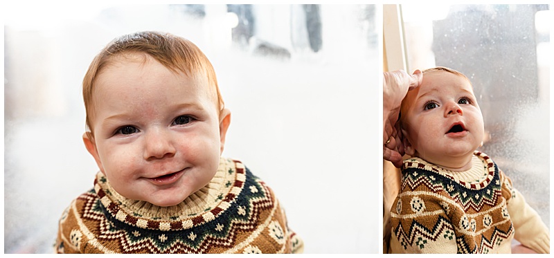 Collage of two. 1. 6 month old in winter sweater smiling at the camera in front of a frosted window. 2. a hand holding the head of the 6 month old while in the window frame.